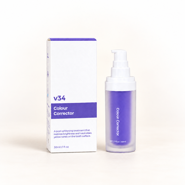 Klinii V34 colour-correcting toothpaste on a soft white and ivory background
