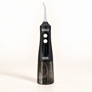Klinii black Water Flosser on a soft white background