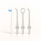 Klinii Water Flosser replacement heads on a soft white and ivory background